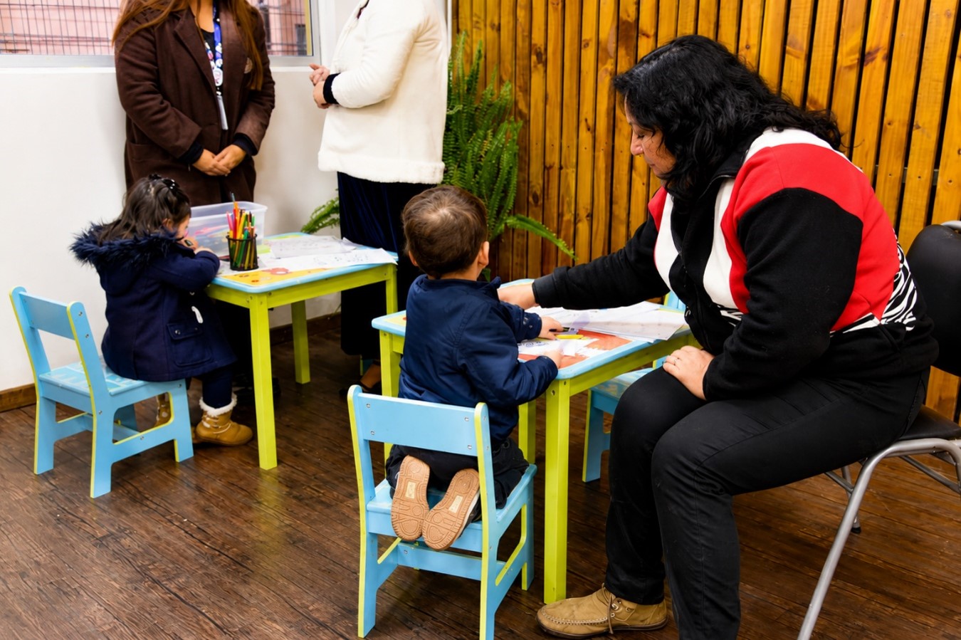 Espacio de actividades para niños, niñas y familias asistentes.